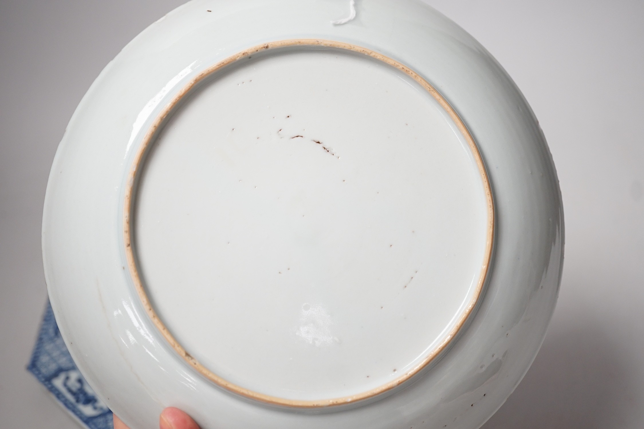 An 18th century Chinese Export octagonal plate and a similar saucer dish. 22.5cm diameter